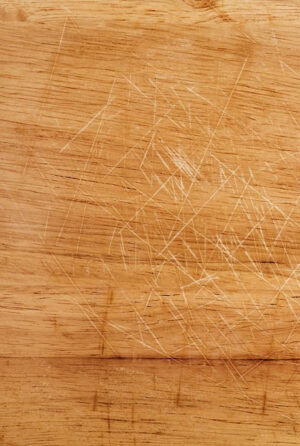 Scratches and veneer damage are common issues when restoring furniture.