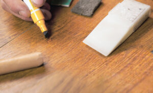 Scratches and veneer damage are common issues when restoring furniture.