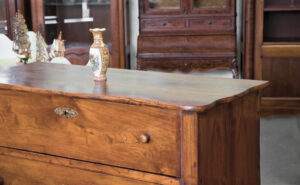 Scratches and veneer damage are common issues when restoring furniture.
