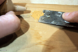 Scratches and veneer damage are common issues when restoring furniture.